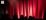 Red vertical light streaks against a dark background, creating an abstract glow.