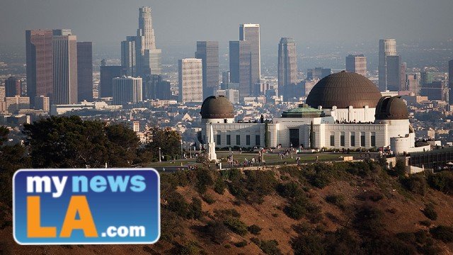 Griffith Observatory overlooking downtown Los Angeles with a mynewsLA.com logo in the lower-left corner.